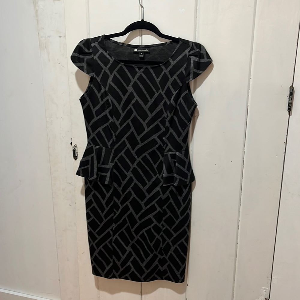 Valerie Bertinelli grey and black peplum dress